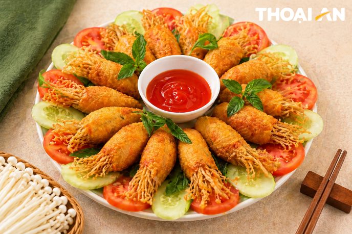 Crispy Fried Fish Cake Wrapped with Enoki Mushrooms – An Easy and Unique Homemade Dish Cha ca boc nam kim cham chien gion logo 1